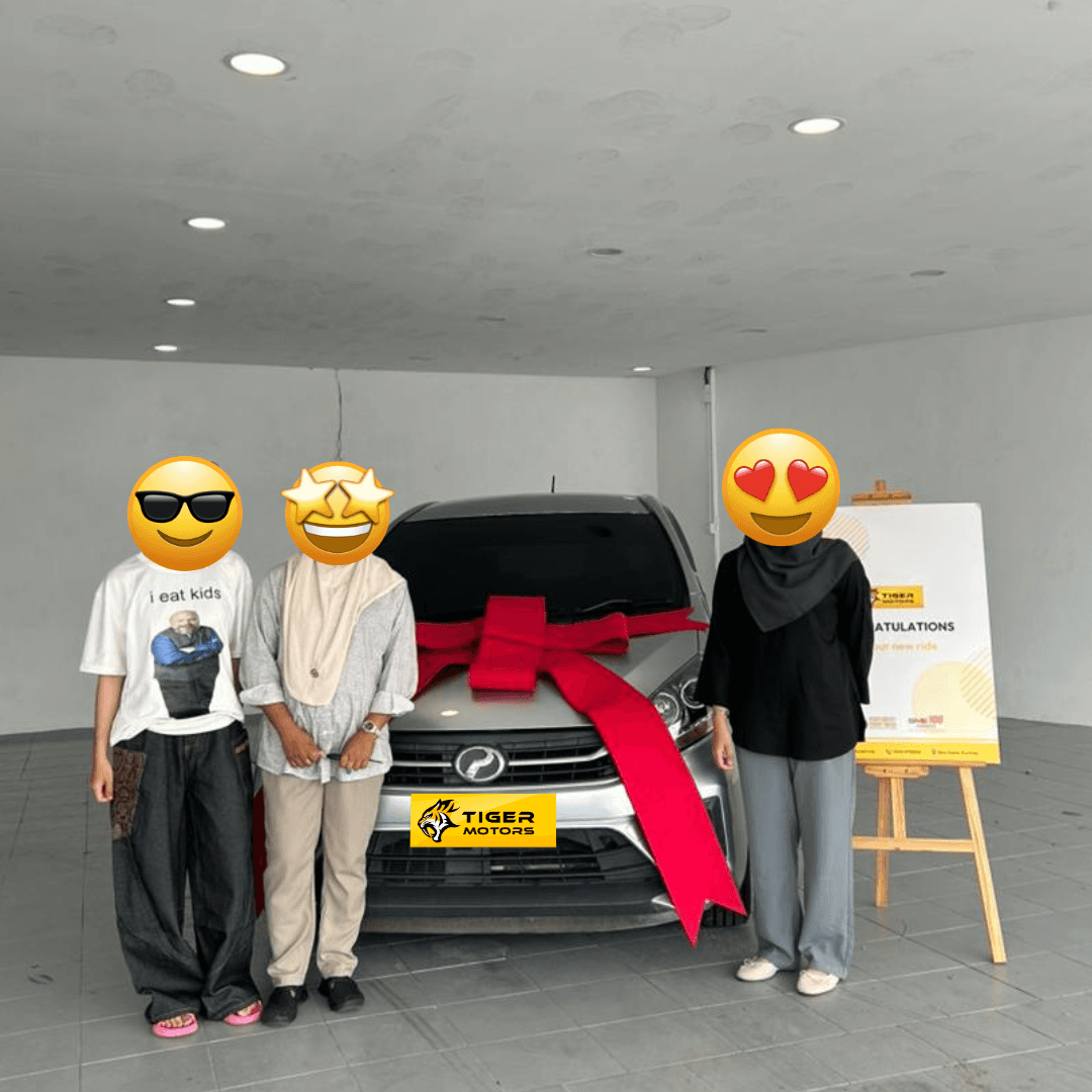 Customer collecting their 2021 Perodua Axia from Tiger Motors in Kuching, Sarawak