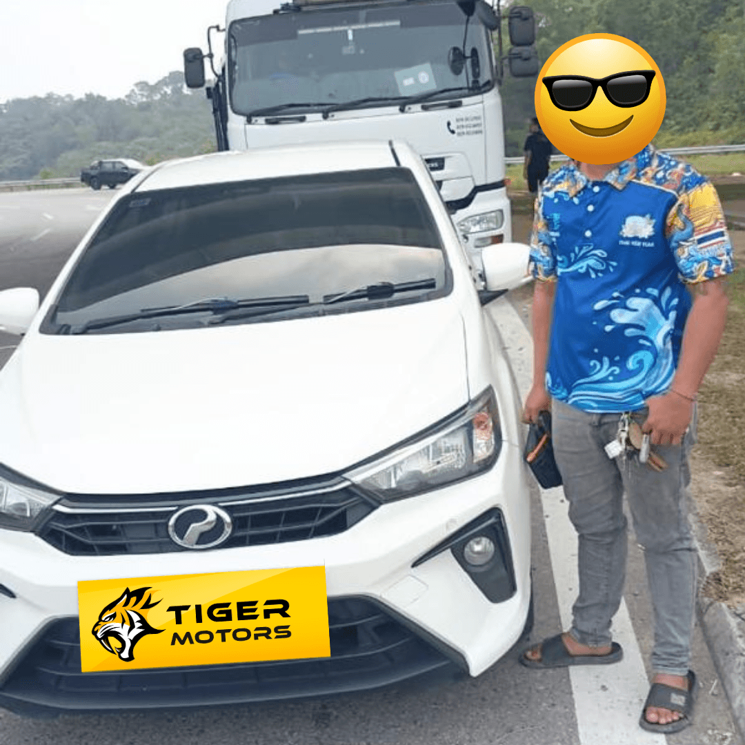 Customer collecting their 2020 Perodua Bezza from Tiger Motors in Kuching, Sarawak