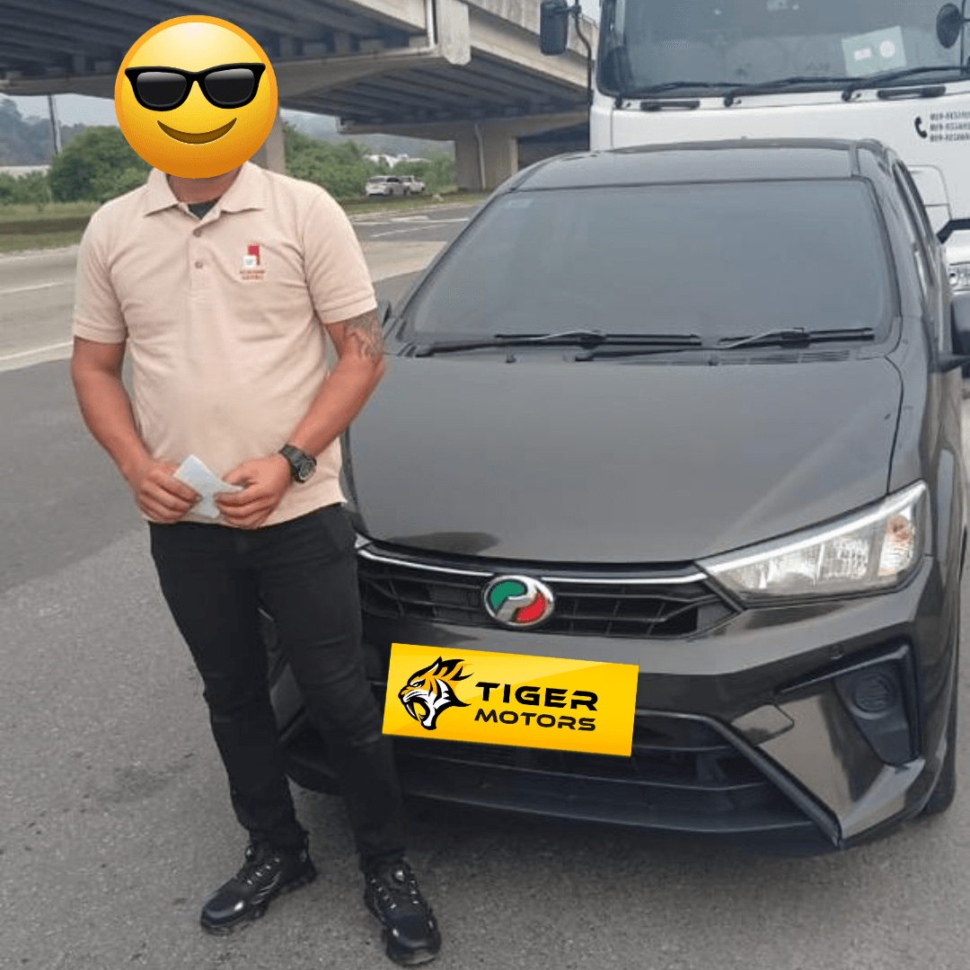 Customer collecting their 2020 Perodua Bezza from Tiger Motors in Kuching, Sarawak