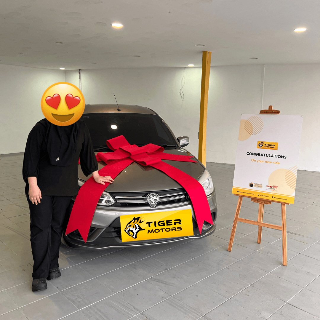 Customer collecting their 2019 Proton Saga from Tiger Motors in Kuching, Sarawak