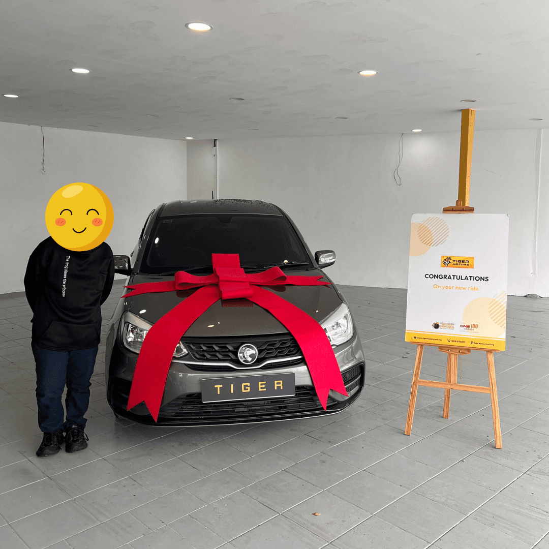Customer collecting their 2023 Proton Saga from Tiger Motors in Kuching, Sarawak