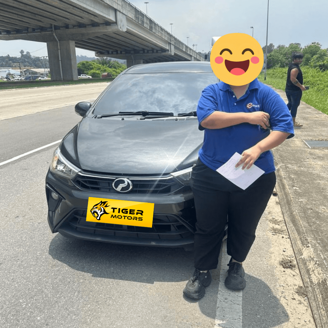 Customer collecting their 2021 Perodua Bezza from Tiger Motors in Kuching, Sarawak