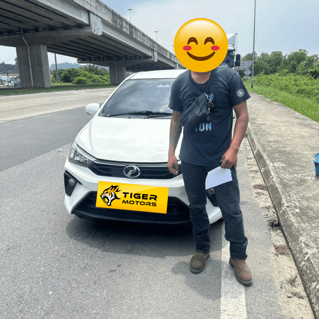 Customer collecting their 2021 Perodua Bezza from Tiger Motors in Kuching, Sarawak