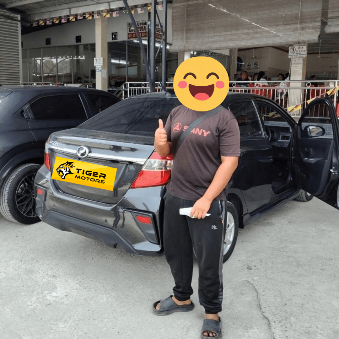 Customer collecting their 2020 Perodua Bezza from Tiger Motors in Kuching, Sarawak