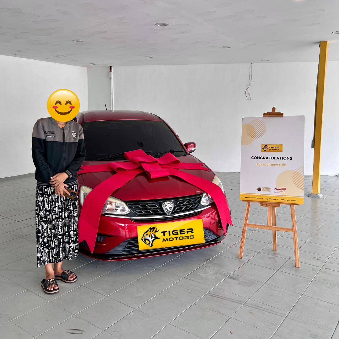 Customer collecting their 2019 Proton Saga from Tiger Motors in Kuching, Sarawak